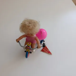 Bambola triciclo latta vintage anni '70