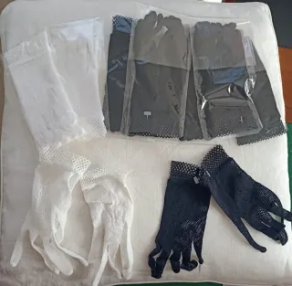 Un par de Guantes de rejilla negros o blancos