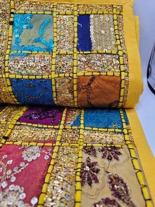 Mantel patchwork amarillo y multicolor