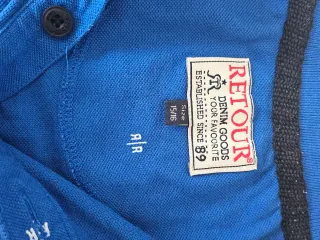 Polo juvenil azul con estampado
