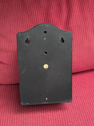 Reloj de pared con mapa y portallaves