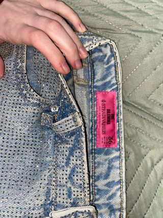 Pantalones Stradivarius plateados brillantes