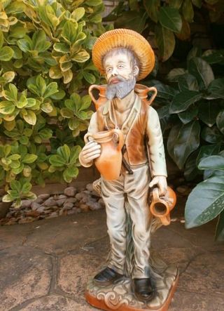 Figura cerámica hombre con cántaros 49cm