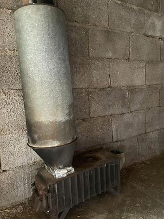 Estufa cáscara almendra metal