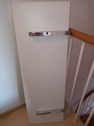 Mesa abatible pared blanca