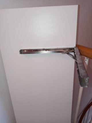 Mesa abatible pared blanca