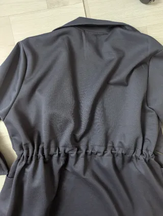 Gabardina Entret. Talla L/XL Negra