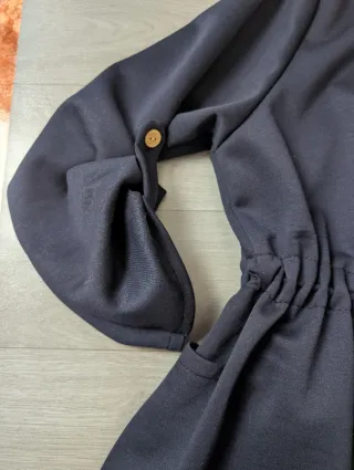 Gabardina Entret. Talla L/XL Negra