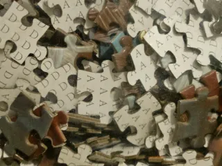 Puzzle perro en baño con móvil