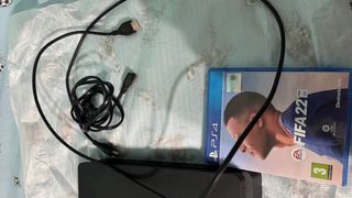 PS4 (PlayStation 4) con 2 mandos y 4 juegos