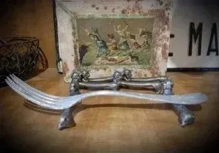 Antiguos reposa cubiertos gato