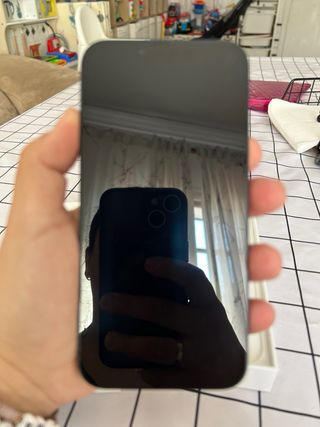 iPhone 13 negro prácticamente nuevo