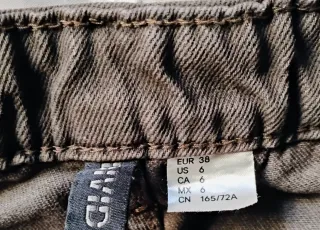 Pantaloncini jeans marroni con frange