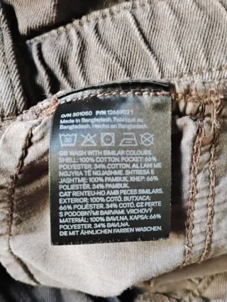 Pantaloncini jeans marroni con frange