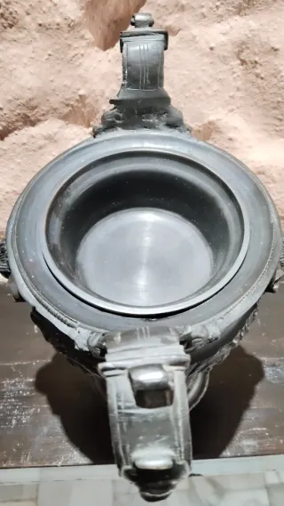 Pieza metal decorativa cara antigua