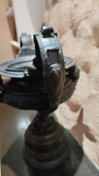 Pieza metal decorativa cara antigua