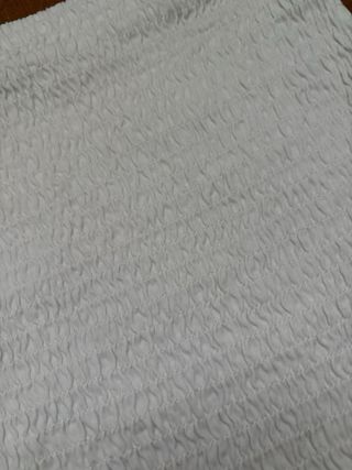 Falda blanca con volantes