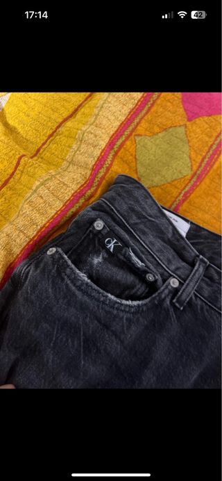 Jeans Calvin Klein neri strappati