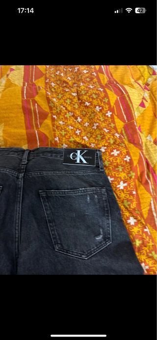 Jeans Calvin Klein neri strappati