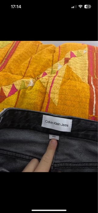 Jeans Calvin Klein neri strappati