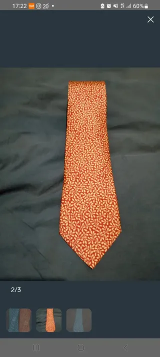 Cravatta rossa e dorata Hermes