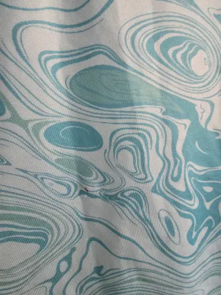 Camiseta sin mangas cuello alto estampado