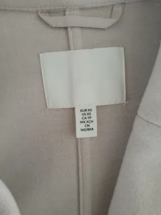 Abrigo  de  entretiempo