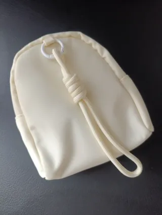 Custodia per bambola con laccetto