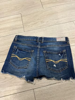 Vaqueros cortos niña desgastados talla 38