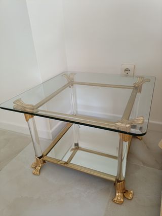 Mesa centro cristal y metal dorado