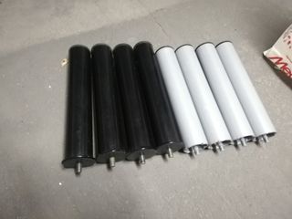 Somier de láminas, doble lecho, con patas.