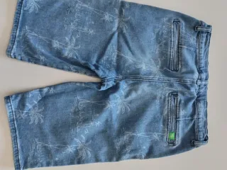 Pantalón corto infantil estampado palmeras