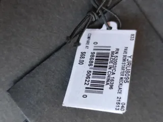 Collar metálico con colgante de lazo nuevo