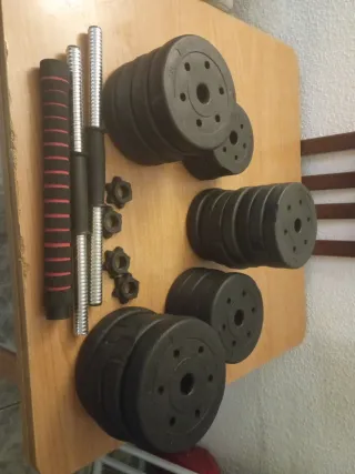 Mancuernas y barra con discos