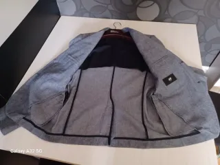 Americana gris con coderas