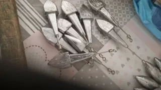 Lote 10 plomos pesca pico de pato 125g y 150g