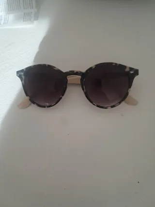 Gafas de sol redondas. Animal print