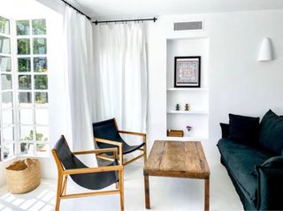 Sillón lounge teca y cuero negro