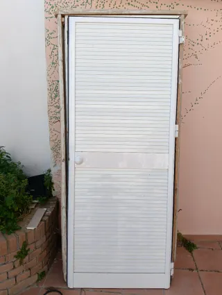 Puertas aluminio Climalit y ventana pequeña