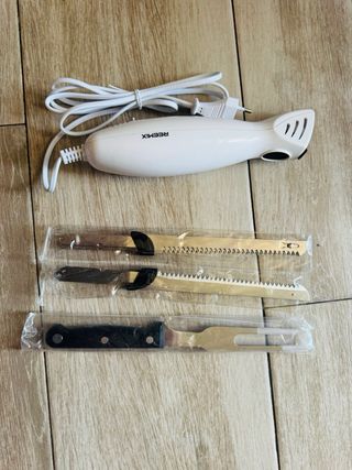 NUEVO! Cuchillo eléctrico con 2 cuchillas nuevo