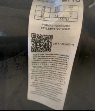 Mono corto Guess negro y turquesa