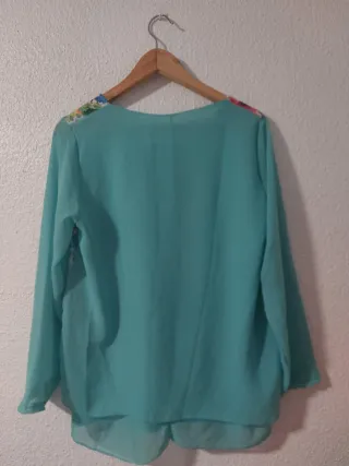 Blusa floral manga larga