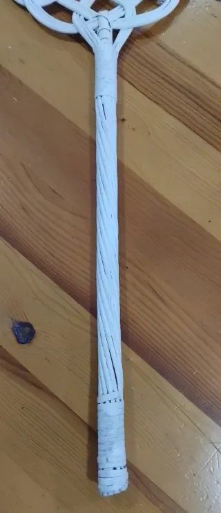 Paleta antigua para limpiar mantas