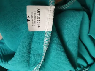 Mono largo con volantes en las sisas