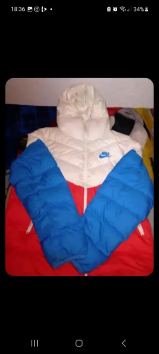 Chaqueta Nike acolchada precio negociable