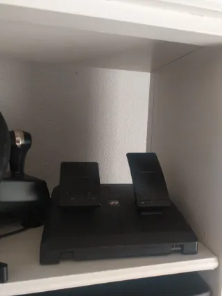 Consola PS4+volante+mando+cascos+juego