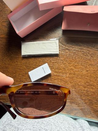 Óculos de Sol Miu Miu Castanhos