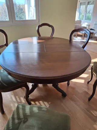 Mesa redonda extensible con 6 sillas