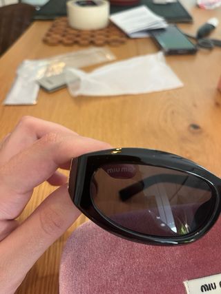 Óculos de sol Miu Miu pretos