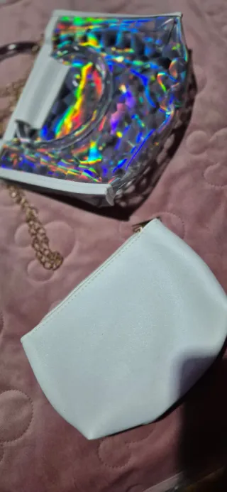 Bolso mano transparente y blanco usado una vez